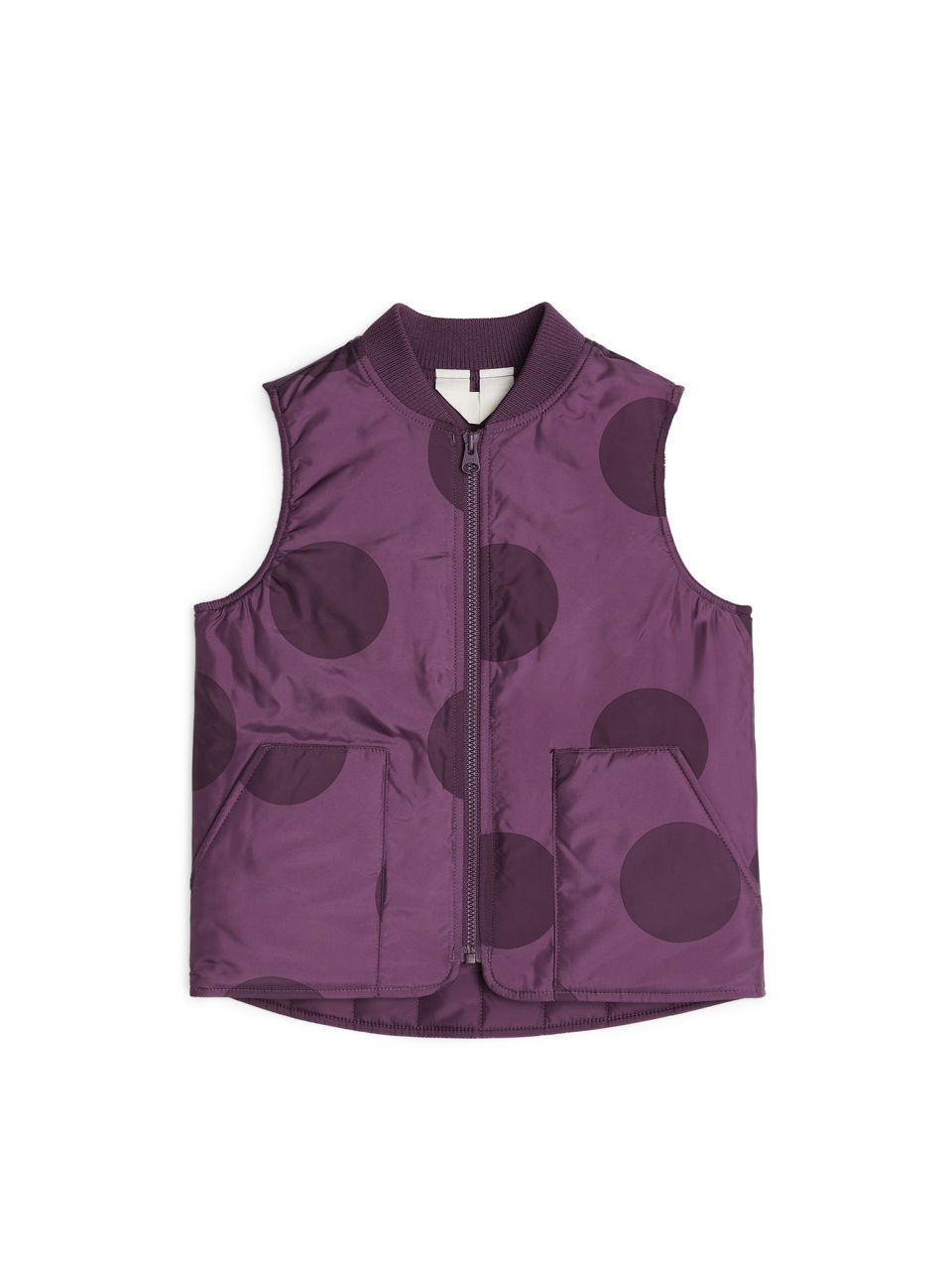 A nylon vest is the perfect top layer for when girls are going out in the cold